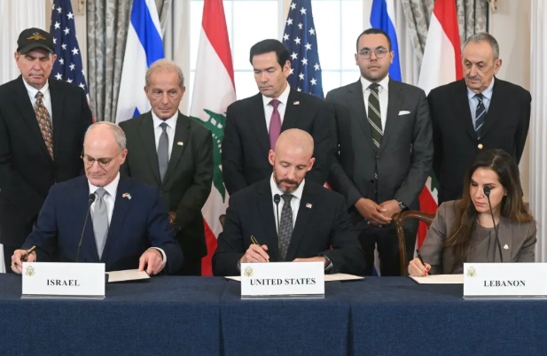 Secretary of State Marco Rubio overlooks Israeli and Lebanese ambassadors and US State Department Chief of Staff Daniel Holler signing a trilateral framework agreement at the Department of State in Washington DC on Friday.